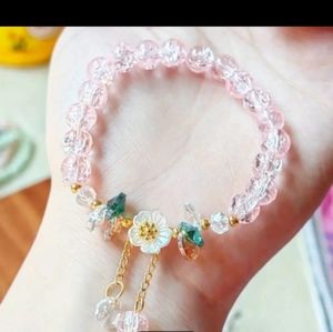BRAND NEW ** JUST LISTED ** BEAUTIFUL PINK BEADED BRACELET WITH HANGING CHARMS